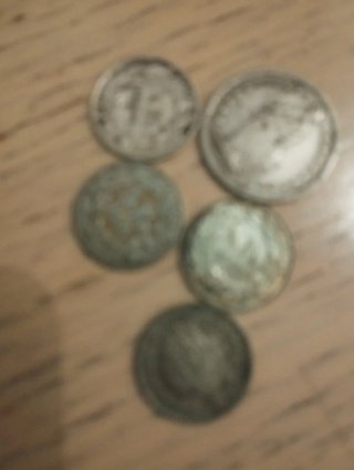 Lote de monedas antiguas, algunas de plata