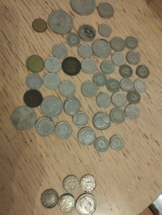 Lote de monedas antiguas, algunas de plata