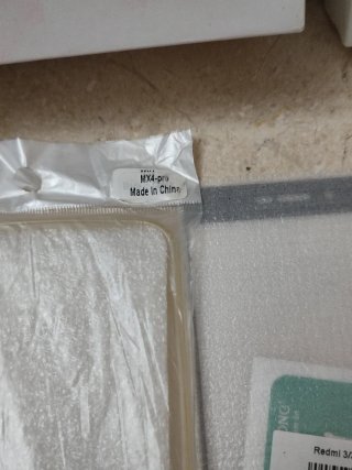 Lote de cajas, fundas, protectores etc de móvilles