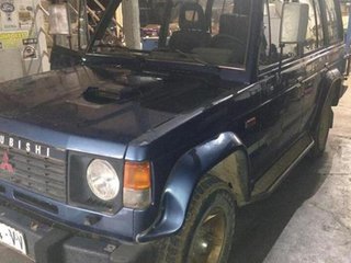 22062 cinturón tk520en090 mitsubishi montero 2.5