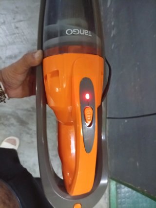 Aspiradora de mano naranja y gris