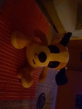 Peluche de perro amarillo