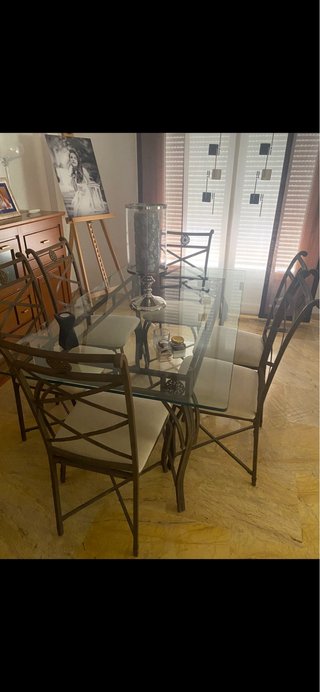 Mesa de comedor de cristal y 6 sillas