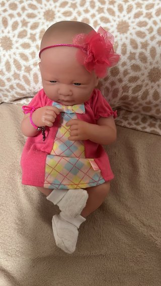 Muñeco bebé con accesorios