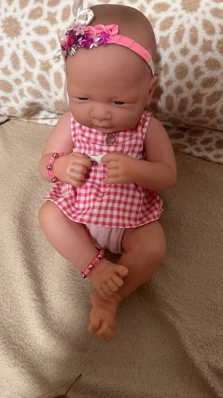 Muñeco bebé con accesorios
