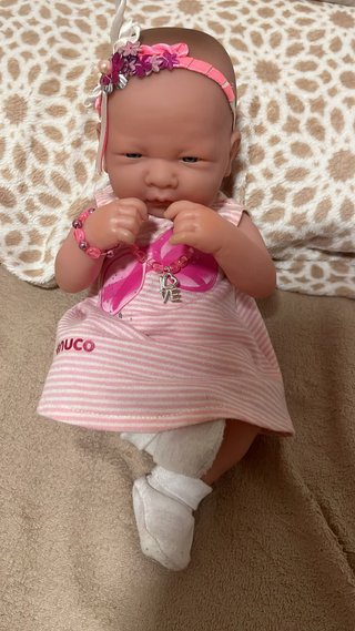 Muñeco bebé con accesorios