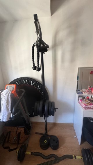 Máquina de pesas con poleas y cuerda