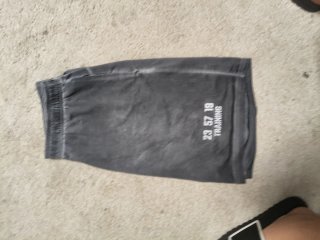 Pantalones cortos grises efecto desgastado