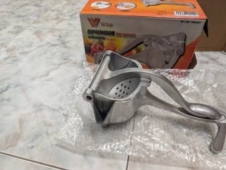 Exprimidor de mano de aluminio