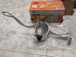 Exprimidor de mano de aluminio