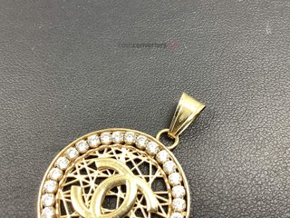 colgante oro 18k con piedra