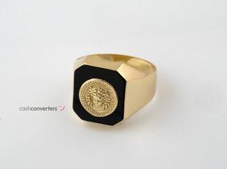 sello oro 18k con piedra con onix