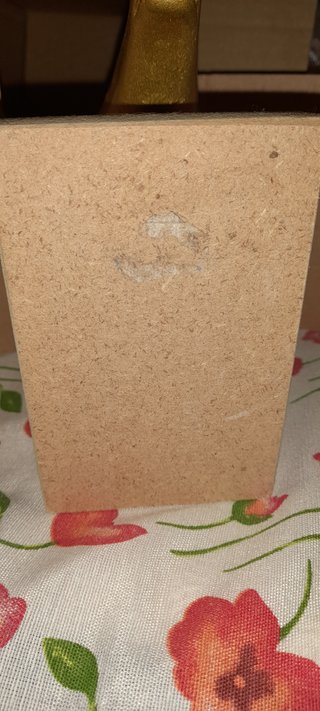 Tapiro in gesso dorato su base legno