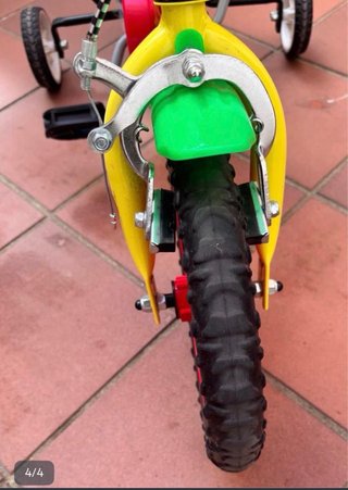 Bicicleta infantil amarilla y roja