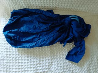 Bandolera de porteo para bañarse