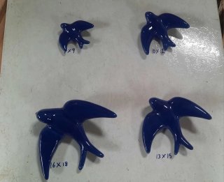 Golondrina cerámica azul decorativa