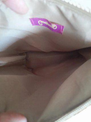 Bolso de rafia rosa empolvado