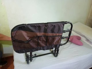 Barrera de cama con organizador