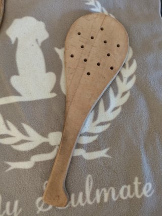 Raqueta tenis antigua y pala frontón de madera