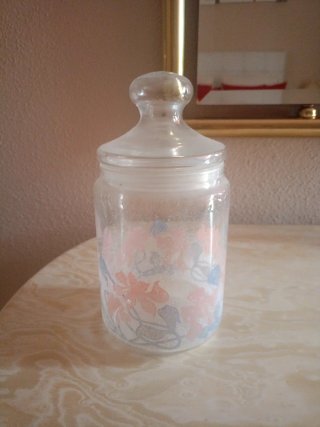 Bote de cristal multiusos con flores