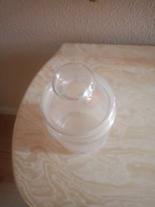 Bote de cristal multiusos con flores