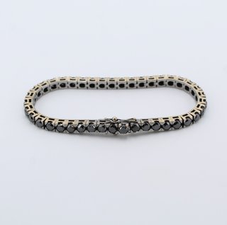 Pulsera de oro blanco de 18k. Peso: 25.84 gr.