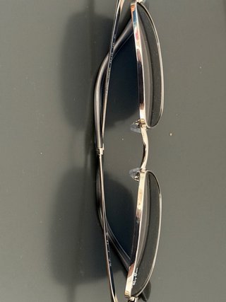 Gafas de sol Ray-Ban negras y plateadas