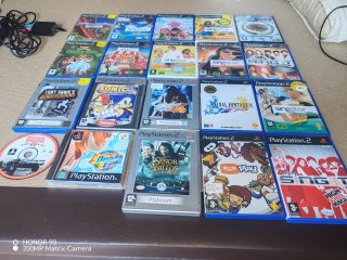 PlayStation 2 con 2 mandos 2 micros y 16 juegos