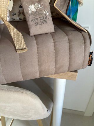 Trona de viaje para bebés.