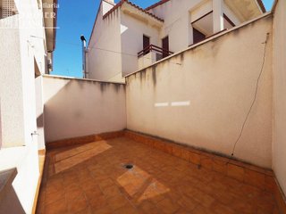 Casa adosada en venta en Tomelloso