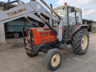 Tractor Kubota M6950 con pala