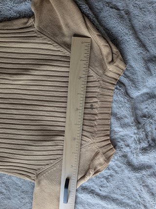Chaqueta larga de punto beige