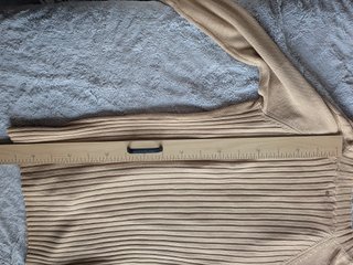 Chaqueta larga de punto beige