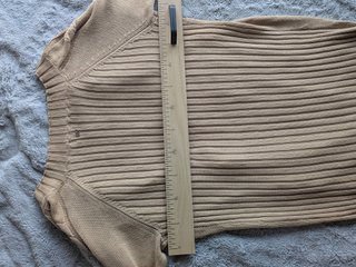Chaqueta larga de punto beige