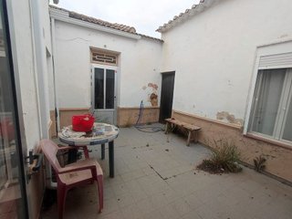 Casa adosada en venta en Tomelloso