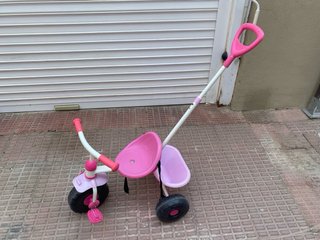 Triciclo rosa para niños