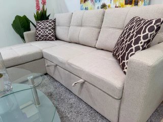 Sofá beige 216cm convertible en cama