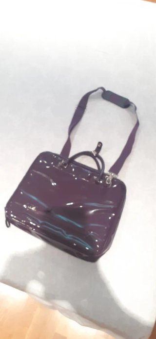Maletín portátil morado acolchado