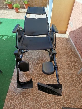 Silla ruedas respaldo reclinable 6 posiciones.