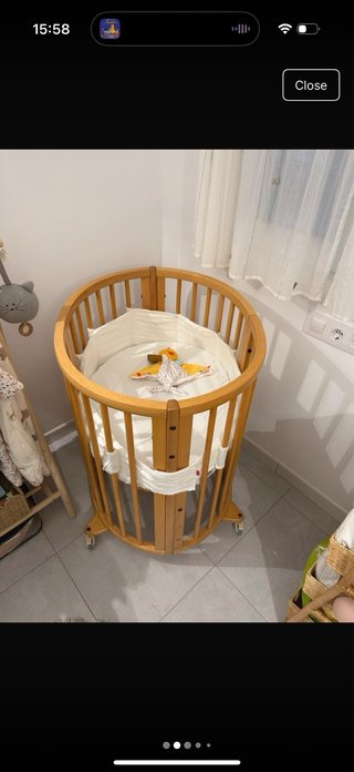Cuna Stokke ovalada de madera