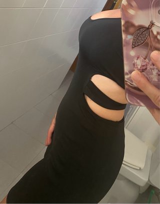 Mono deportivo negro con una tirantes