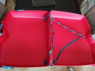 Maleta rígida Tauro con ruedas roja
