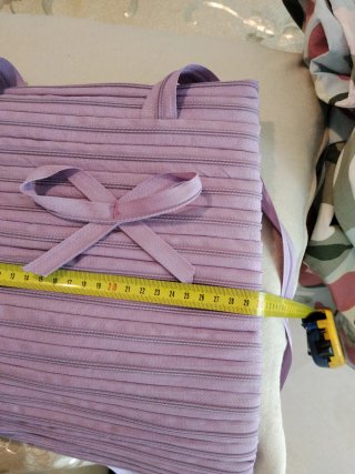 Bolso cremallera lila con lazo
