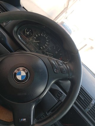 Volante BMW E46 y posabrazos