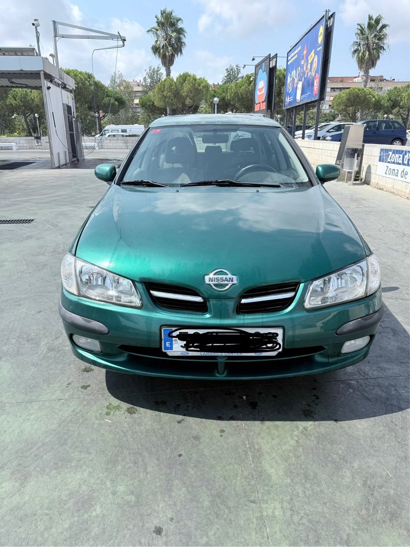 Nissan Almera 2001 - foto 1