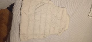 Chaleco plumífero Uniqlo beige talla única