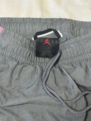 Pantalón chándal Jordan gris y lila