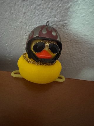 Pato de goma motorista con luz