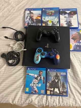 Consola PS4 Pro Negra + 6 Juegos