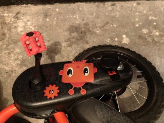 Bici infantil Btwin naranja y negra